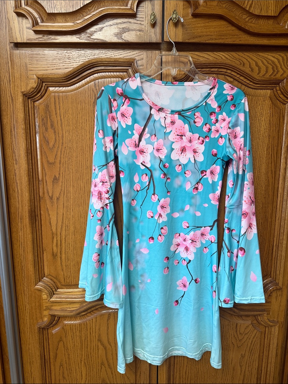 Women’s Long bell Sleeve Floral Swing Dress - Pink cherry Blossom on Aqua blue